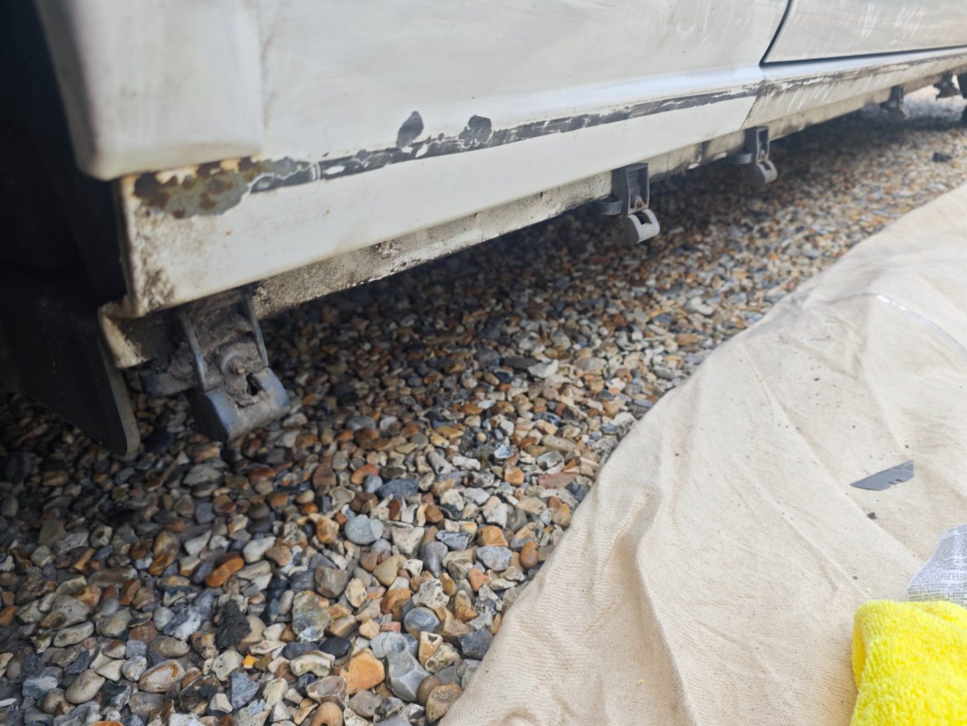 Before Before car paintwork damage repair on bottom sill - Bodywork Repair service @ Sprayworkz in Reading Berkshire