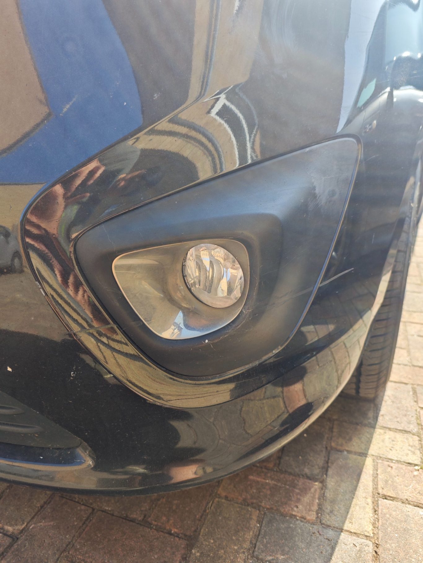 Before Before car Front bumper scuff repair - Bodywork Repair service @ Sprayworkz in Reading Berkshire